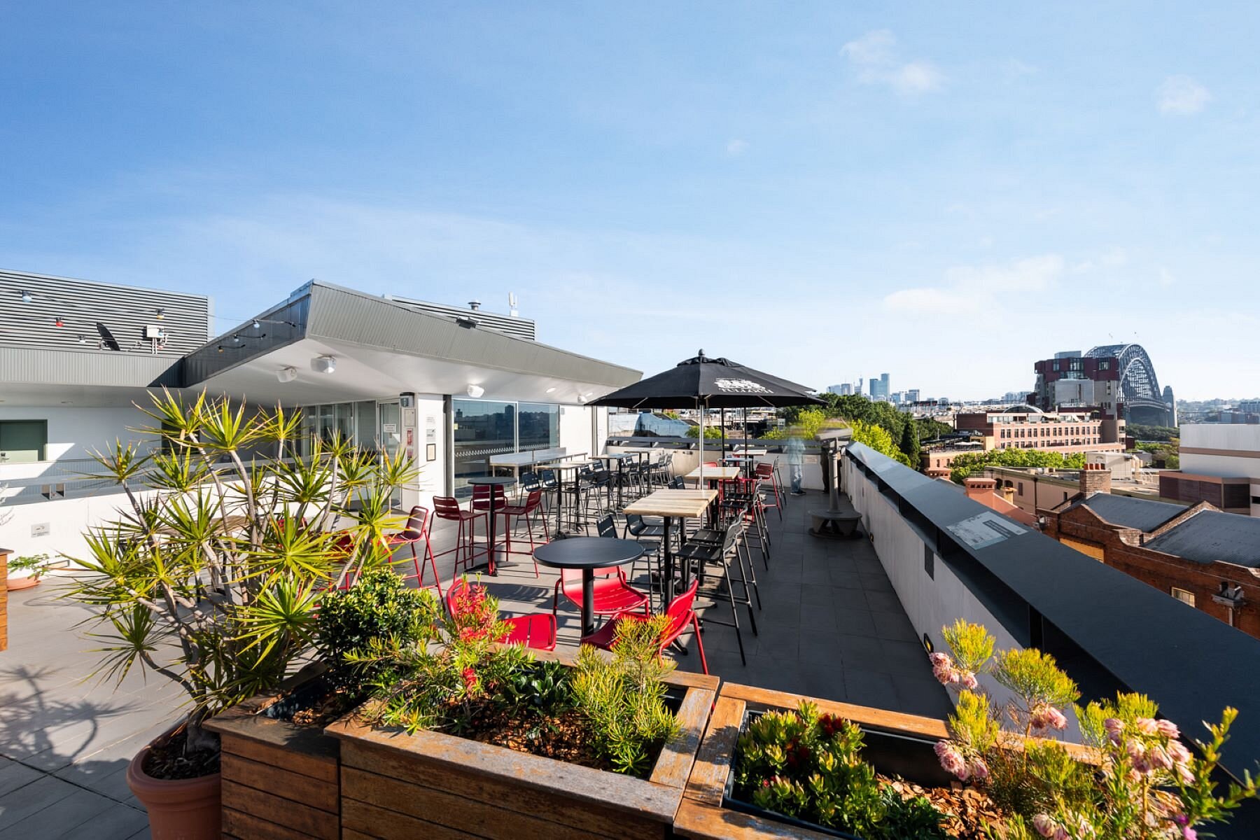 Rooftop terrace seating at YHA Sydney Harbour